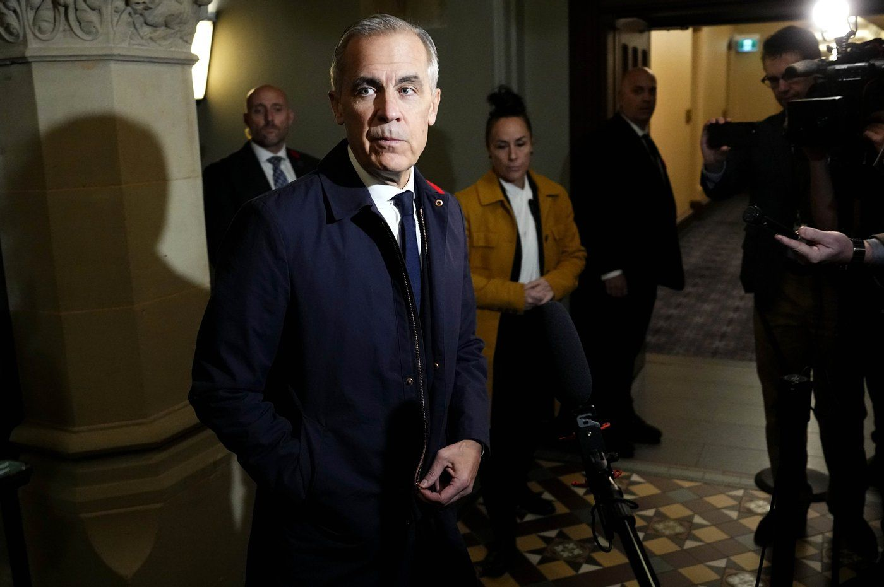 Prime Minister Mark Carney arrives on Parliament Hill before a meeting of the federal cabinet in Ottawa, on Tuesday, Oct. 27, 2026.