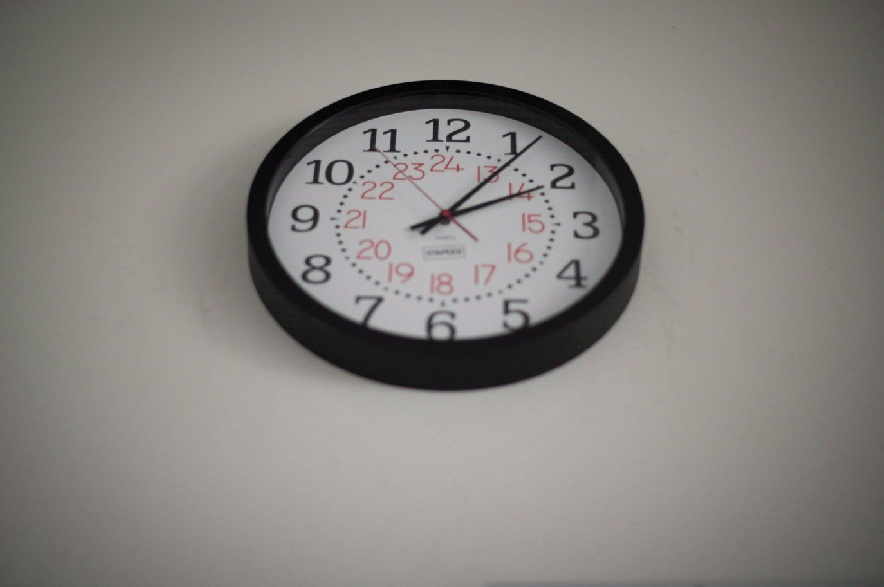 A clock is pictured on the wall at McGee Secondary school in Vancouver, B.C. Friday, Sept. 5, 2014.