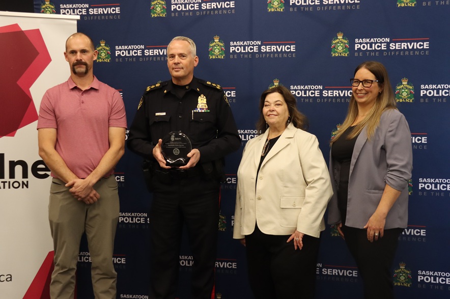 Chris Martin, Chief Cameron McBride, Joyce Van Deurzen, and Errin Willenborg.