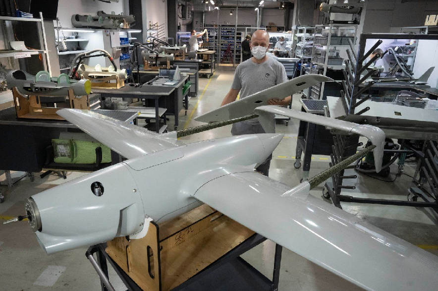 In this file photo taken Wednesday, Sept. 25, 2024, a worker assembles a Raybird long-range surveillance drone at the Skyeton drone-manufacturing hub in the Kyiv region, Ukraine.