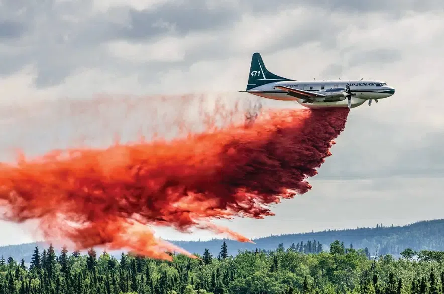A Saskatchewan water bomber battles a fire.