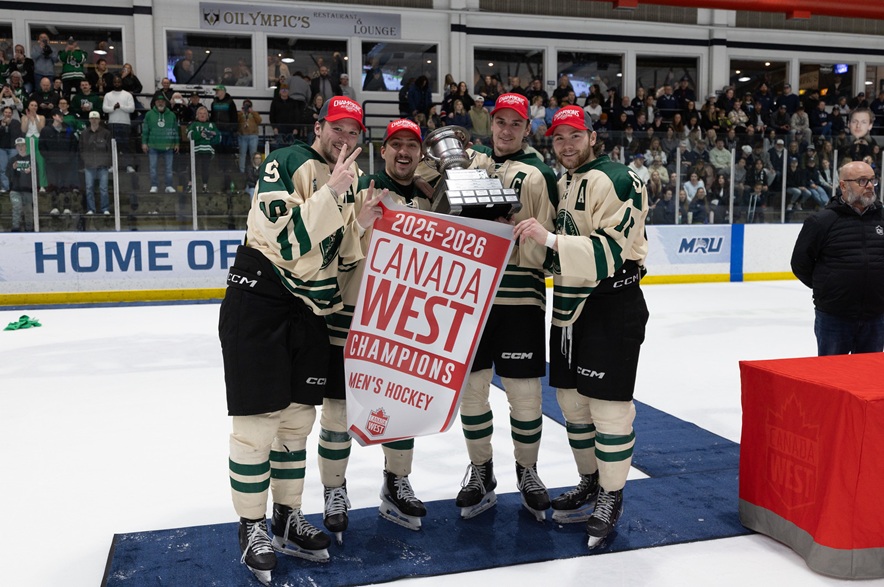University of Saskatchewan Huskies celebrating their 2025-26 Canada West men's hockey championship on March 7, 2026 following a Game 2 victory over the Mount Royal Cougars.