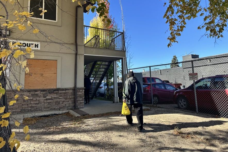 Following Melissa Zimmer with Bridge City Warmth, David Fineday walks towards his new apartment in Saskatoon for the first time on Oct. 15, 2026.