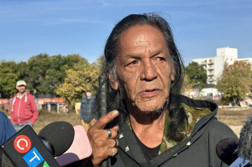David Fineday speaks to reporters on Sept. 24, 2026, when a protest broke out in response to the City of Saskatoon's first attempt to clear the encampment at 20th Street and Avenue K. (Libby Gray/650 CKOM)
