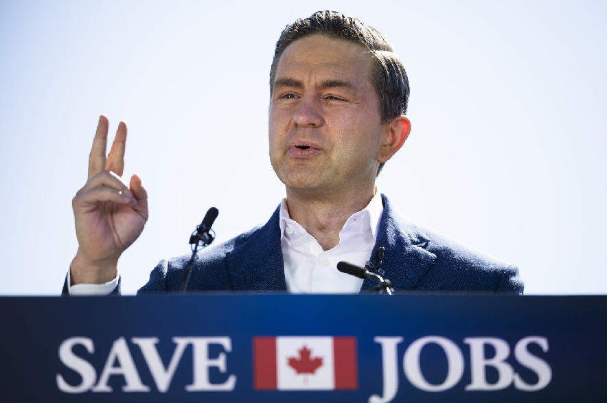 Conservative Leader Pierre Poilievre speaks about job losses during a press conference across the Hamilton Harbour from the Stelco steel production facility in Burlington, Ont., on Friday, Oct. 9, 2026.