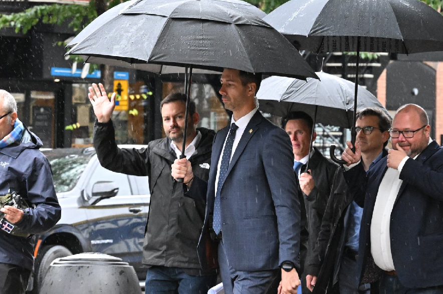 Parti Québécois Leader Paul St-Pierre Plamondon waves to applauding supporters as he walks to a news conference with local candidates in Quebec City, Friday, Oct. 2, 2026. Quebecers are going to the polls for a provincial election on Oct. 5.
