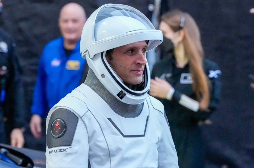 Astronaut Joshua Kutryk, of Canada, leaves the Operations and Checkout Building at the Kennedy Space Center in Cape Canaveral, Fla., Thursday, Oct. 1, 2026.
