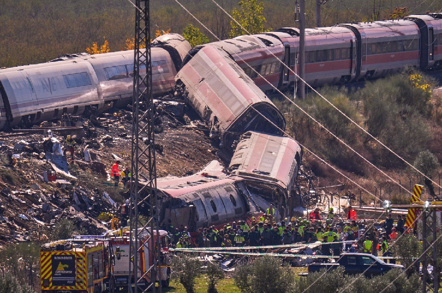 Emergency services work at the scene of a collision between two trains in Urda, Spain, on Wednesday, Oct. 28, 2026.