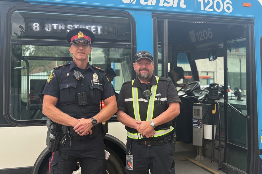 Sgt. Ken Kane of the Saskatoon Police Service and Operations Superintendent with Saskatoon Transit, Jason Wiebe,
