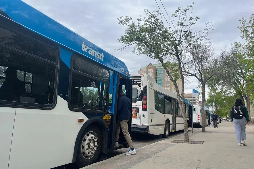 Passengers board a Saskatoon Transit bus at the city's downtown bus terminal.