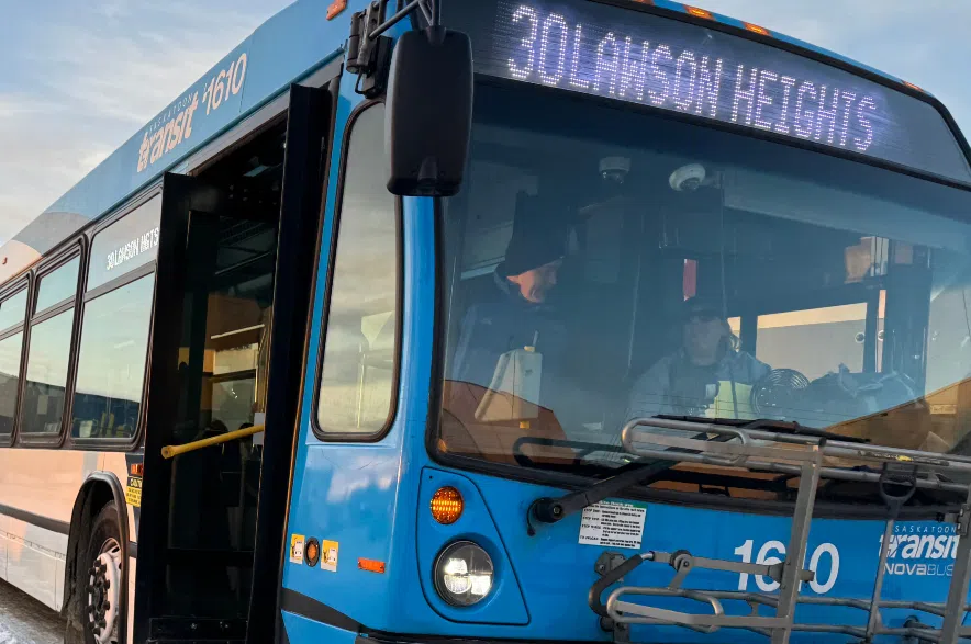 A blue Saskatoon Transit bus, displaying a sign for Route 30 in Lawson Heights.
