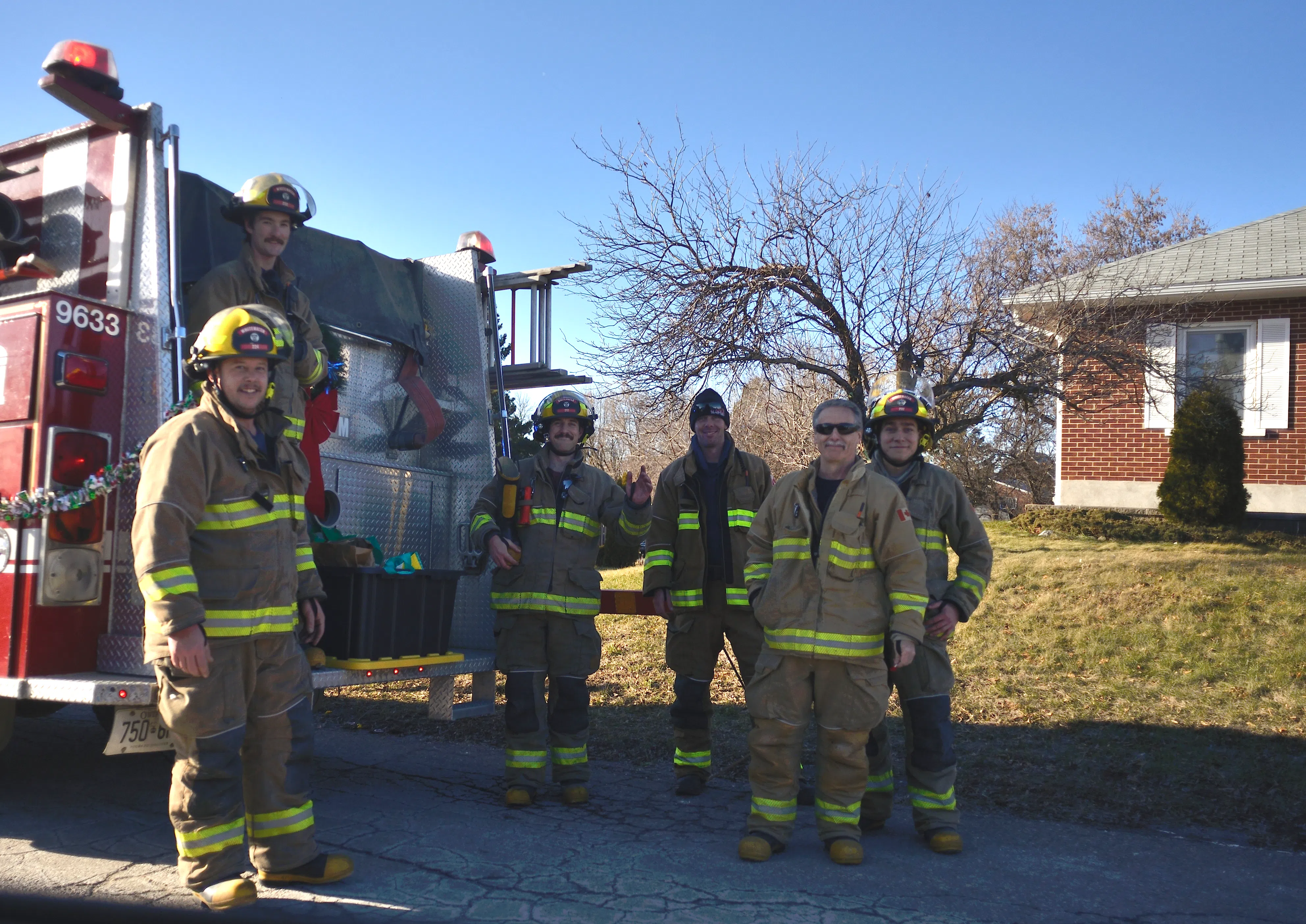 Whitewater Region Fire Department's firefighters taking a quick break after the parade | Mik Horvath/MBC