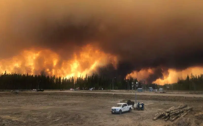 Northern Alberta Town Evacuates As Wildfire Burns Near Border