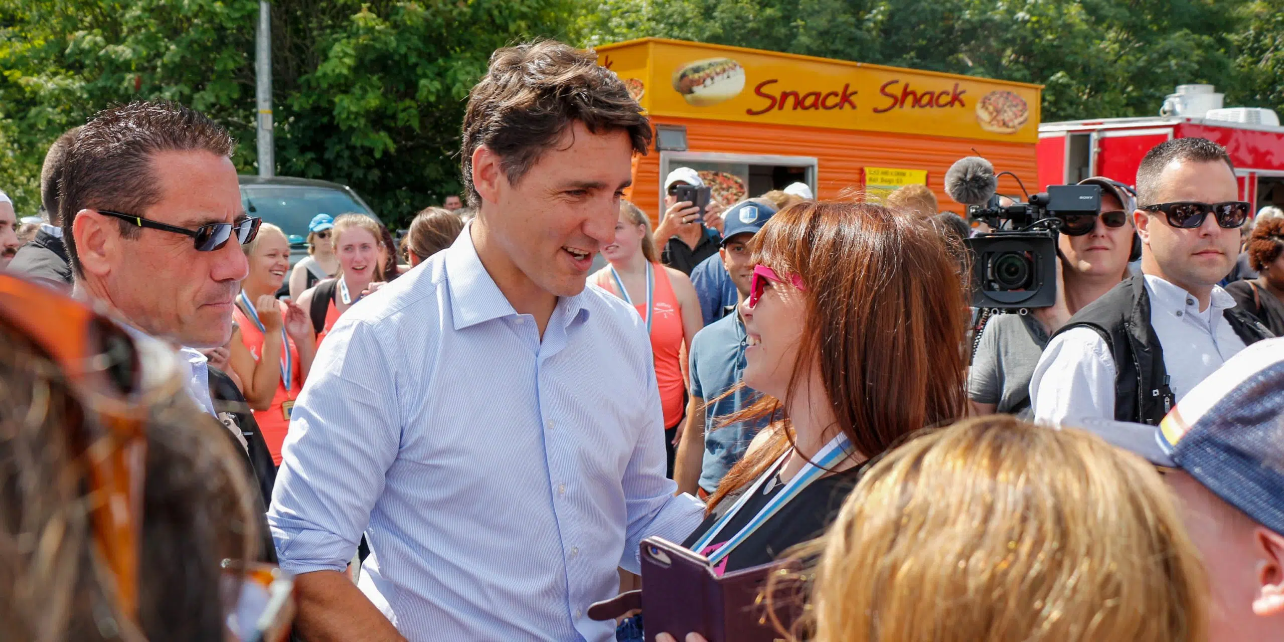 Prime Minister Enjoys Cheers, Some Jeers, from Regatta Crowd