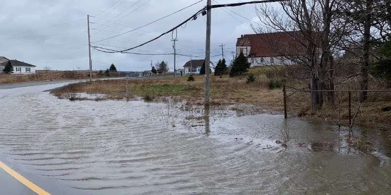 Heavy Rainfall Causes Flooding on Road in Bareneed