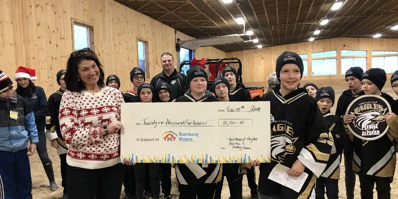 Northeast Eagles Peewee Hockey Team Lightens the Load for Rainbow Riders