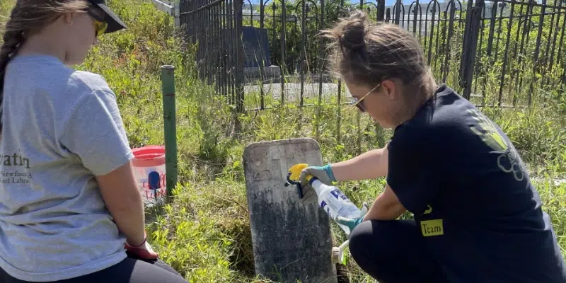 Conservation Corps Green Team Clean Up Headstones at Immaculate Conception Cemetery