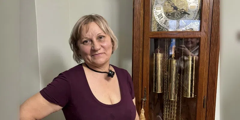 Ukrainian Woman Sees High Demand for Clock Fixing Skills