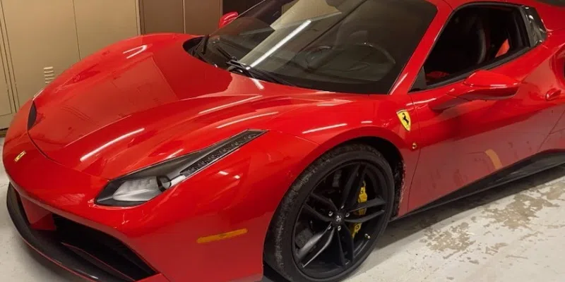 RCMP Raid Yields Stolen Ferrari and BMW, Illegal Weapons, Cocaine