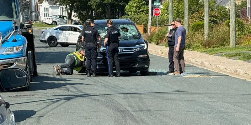 Two Hospitalized After Van Hits Parked Car in St. John's