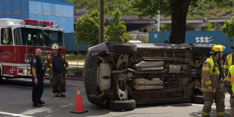 Car on Side in Crash on Water Street West