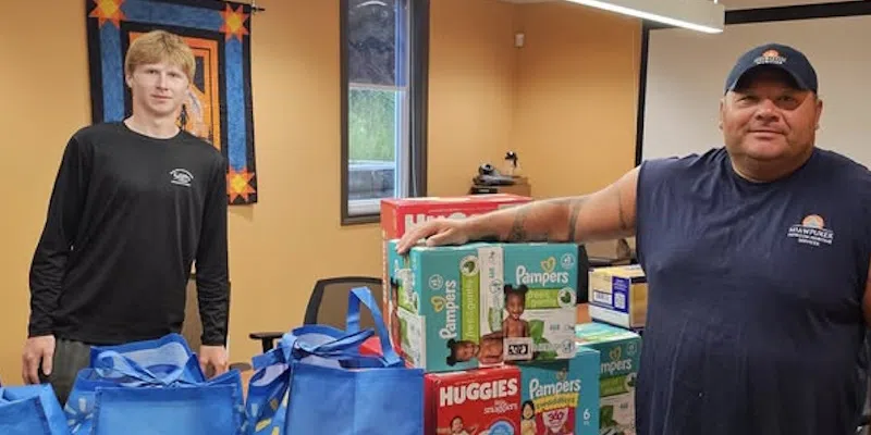 Conne River Residents Make Delivery of Baby Supplies as Martin Lake Fire Burns