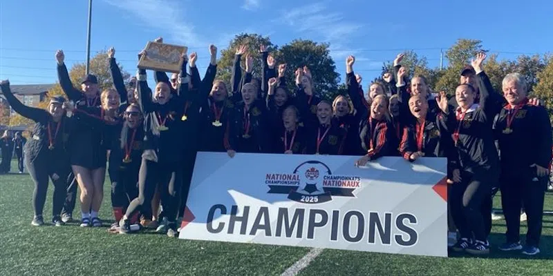 Holy Cross Men and Women Claim National Titles on Home Turf