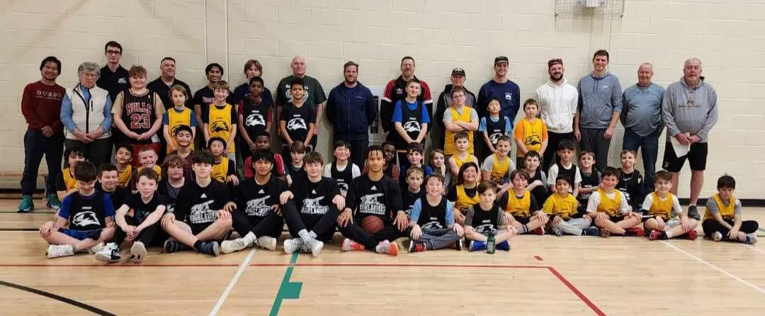 BMHS Highlanders Help Out Young Basketball Players