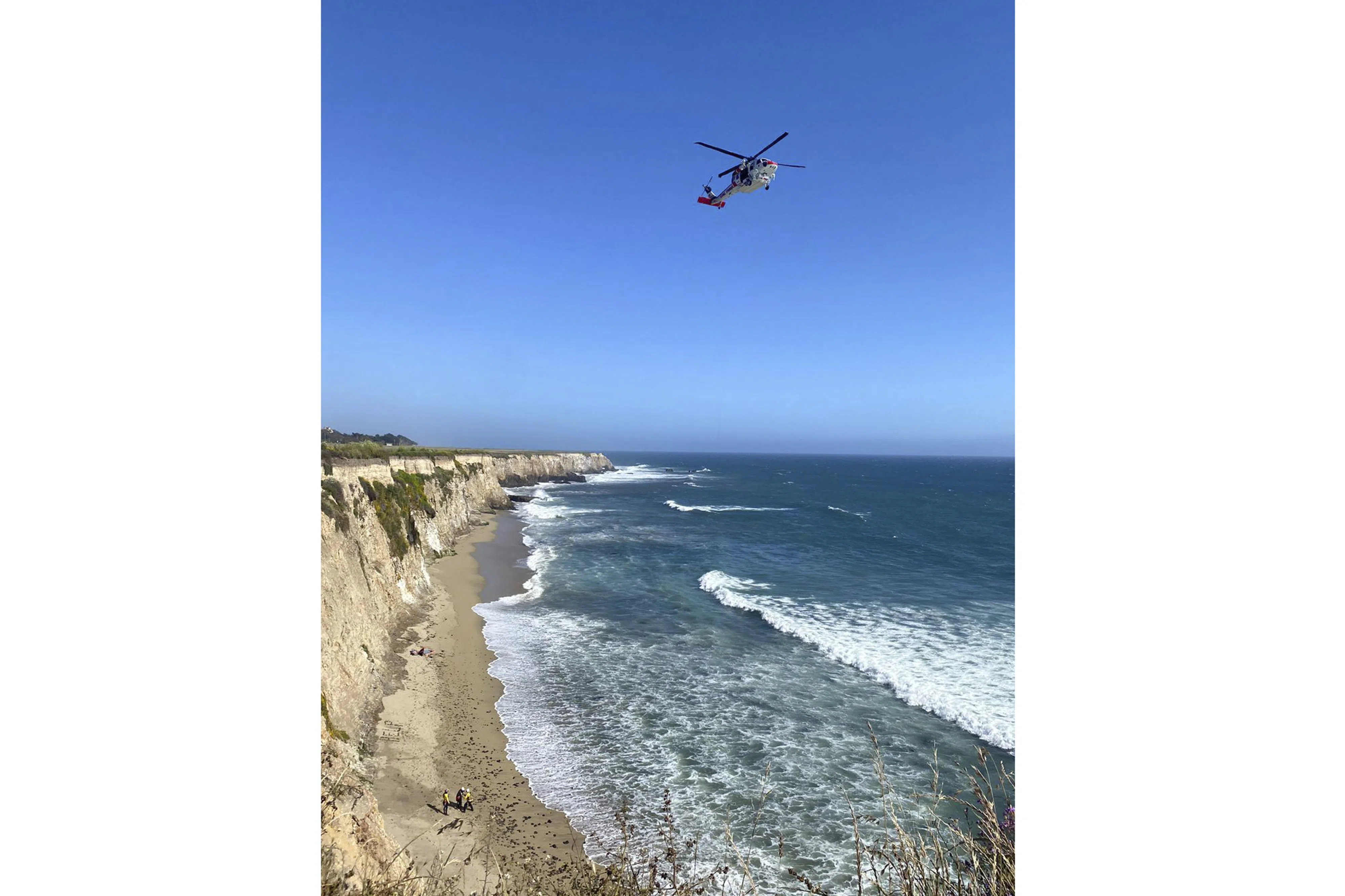 Kite Surfer Rescued from Remote California Beach After Making 'HELP' Sign with Rocks