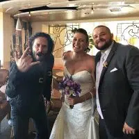 Keanu Reeves Poses With Newly Weds