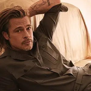 Brad Pitt is being FLIRTY on his new set....